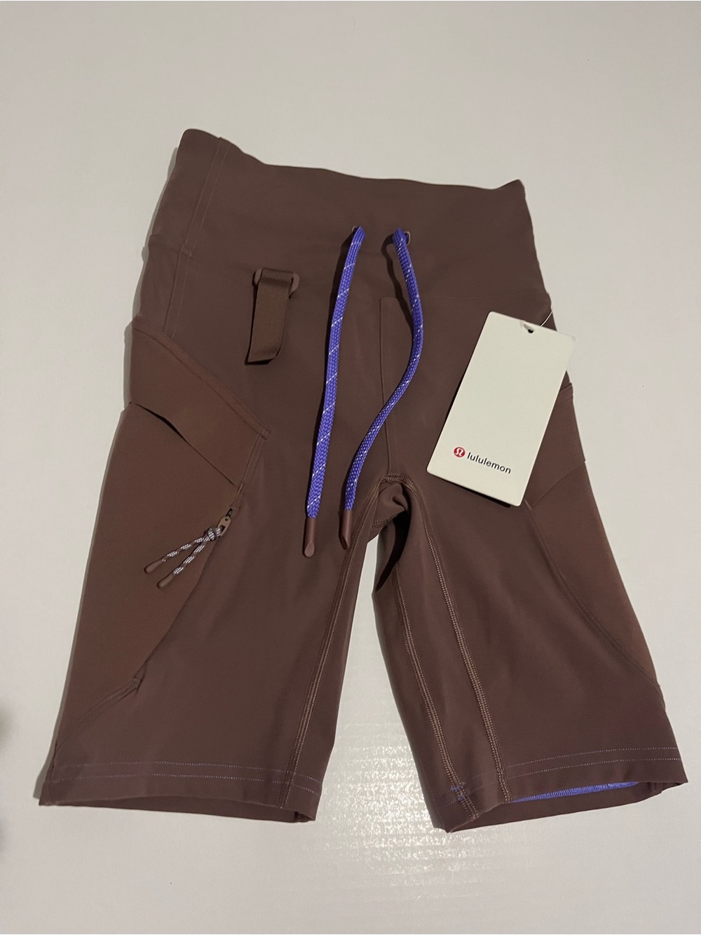 Lululemon Women's Brown Athletic Shorts with Purple Drawstring